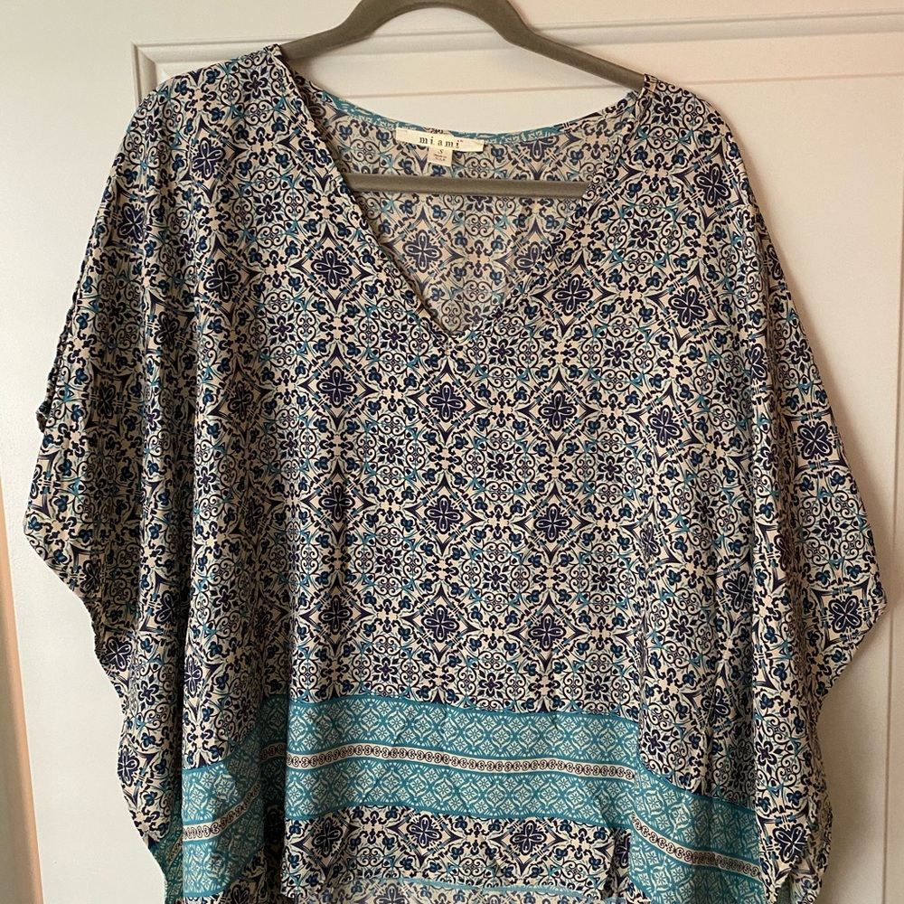 Light, short leave blouse
